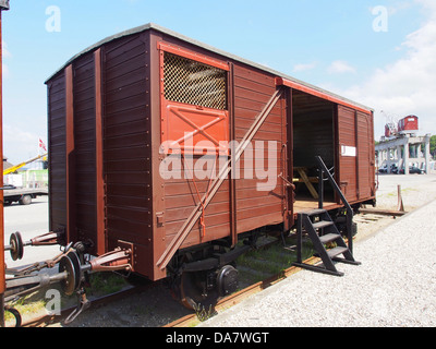 A photo of a historic Danish railroad car from the Mariager-Handest Veteran Railway. The image captures the classic design of the railcar, a relic of Danish railway history. Stock Photo