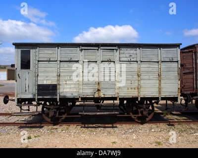 A vintage Danish railroad car from the Mariager-Handest Veteranjernbane, a heritage railway line. The car is a preserved piece of railway history from the early 20th century, showcasing the style and technology of its era. Stock Photo