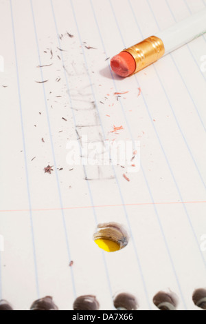 The pencil written word failure erased on paper. Stock Photo