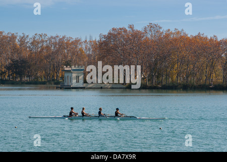 Photograph of four women training in a coxless four rowing boat. Stock Photo