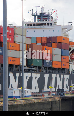 NYK Line ship in the Panama Canal with containers stacked on deck. Stock Photo
