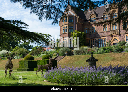 Bolham, Tiverton, Devon, UK. July 5th 2013. The front of Knightshayes Court and part of the formal gardens. Stock Photo