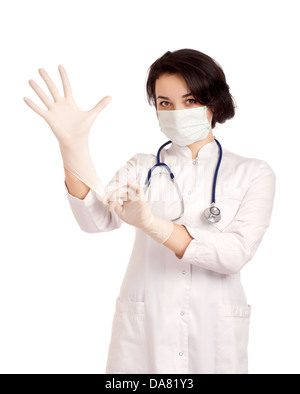Doctor putting on gloves Stock Photo
