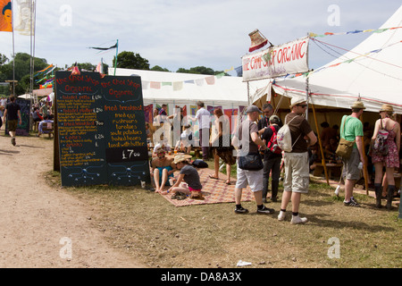 Organic food stall at the Glastonbury festival 2013, Pilton, Somerset, England, United Kingdom. Stock Photo