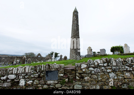 Ardmore historical round tower on the south coast of Ireland is a monastic tower built in the 12th Century in County Waterford Stock Photo