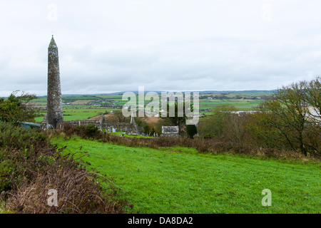 Ardmore historical round tower on the south coast of Ireland is a monastic tower built in the 12th Century in County Waterford Stock Photo