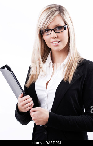 Portrait of beautiful young businesswoman holding laptop in office ...