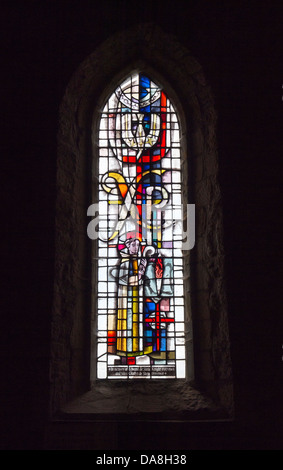 Stained Glass window in Parish Church of St.Mary the Virgin, Lindisfarne, Holy Island, Northumberland, England Stock Photo