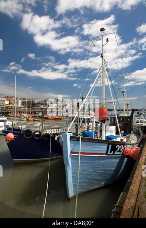 Fishing boats moored in Bridlington Harbour on the Yorkshire Coast. Stock Photo