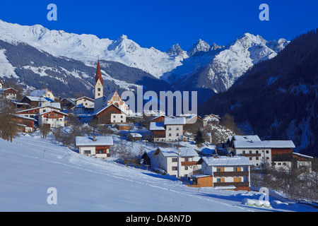 Austria, Europe, Tyrol, uplands, Tirol uplands, Oberes Gericht, Kauns, Kaunertal, winter, snow, place, church, houses, homes, mo Stock Photo