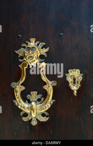 Ornate brass door knocker Modena Italy Stock Photo