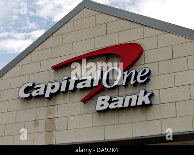 The capital one sign and loan on the the front of their bank building. Stock Photo