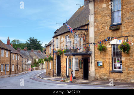 main road in Abbotsbury, Dorset, United Kingdom Stock Photo