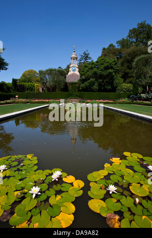 Pond in Sunken Garden with clock tower, Filoli, Woodside, California, United States of America Stock Photo