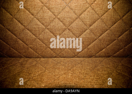 Brown quilted upholstery background or texture Stock Photo