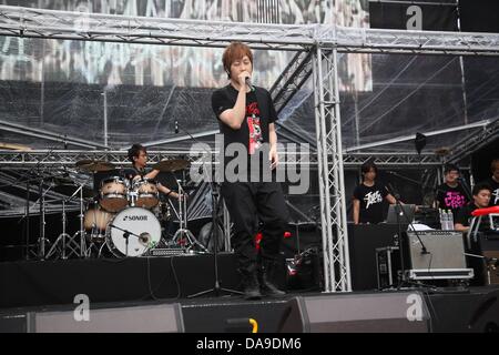 Mayday took a concert in storm in Huabo,Taiwan,Chian on Sunday July 07,2013. Stock Photo