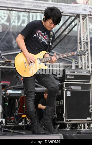 Mayday took a concert in storm in Huabo,Taiwan,Chian on Sunday July 07,2013. Stock Photo