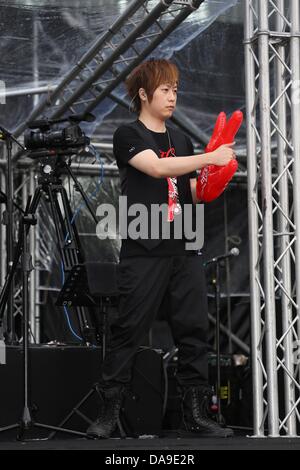 Mayday took a concert in storm in Huabo,Taiwan,Chian on Sunday July 07,2013. Stock Photo