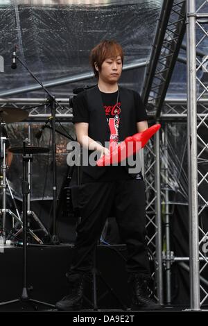 Mayday took a concert in storm in Huabo,Taiwan,Chian on Sunday July 07,2013. Stock Photo