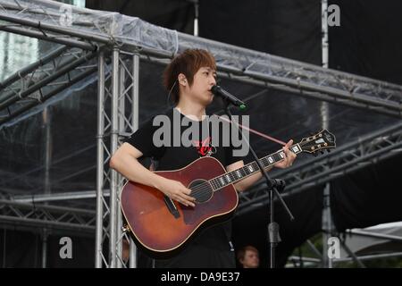 Mayday took a concert in storm in Huabo,Taiwan,Chian on Sunday July 07,2013. Stock Photo