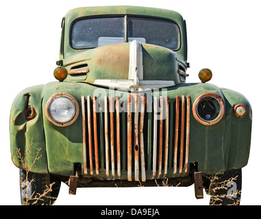 Dented up pick up truck cut out of a junkyard. Isolated on white with a clipping path Stock Photo
