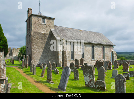 The Anglo-Saxon Bewcastle Cross, next to St Cuthbert's Church, Bewcastle, North Cumbria, England UK Stock Photo