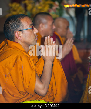 Paris, Fra-nce, Tibetan Monk in Traditional Costume, Praying Altar in Buddhist Ceremony, Pagoda Temple, tibet people Stock Photo
