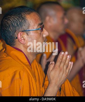 Paris, Fra-nce, Tibetan Monk in Traditional Costume, Praying in Buddhist Ceremony, Pagoda Stock Photo