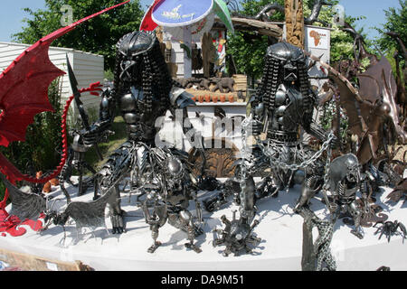 London, UK. 8th July, 2013. Sculptures in metal at the RHS Hampton Court Palace Flower Show. Credit:  martyn wheatley/Alamy Live News Stock Photo