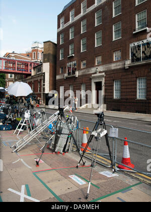 The media from across the world mark their spots in front of the Lindo Wing at St. Mary's Hospital, Paddington, London, UK on 8th July 2013 in anticipation of the birth of the Royal baby. The first child of the Duke and Duchess of Cambridge, Prince George of Cambridge (George Alexander Louis) was born on 22 July and made his first public appearance at the Lindo Wing doors. Stock Photo