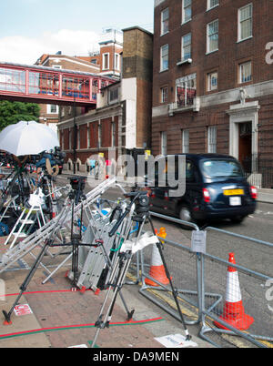 The media from across the world mark their spots in front of the Lindo Wing at St. Mary's Hospital, Paddington, London, UK on 8th July 2013 in anticipation of the birth of the Royal baby. The first child of the Duke and Duchess of Cambridge, Prince George of Cambridge (George Alexander Louis) was born on 22 July and made his first public appearance at the Lindo Wing doors. Stock Photo