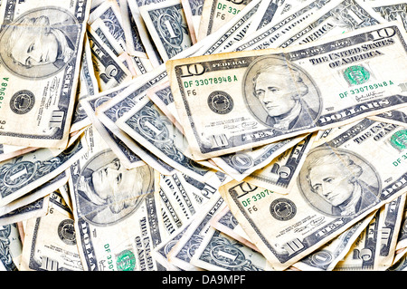 Loose pile of American money of various denominations Stock Photo