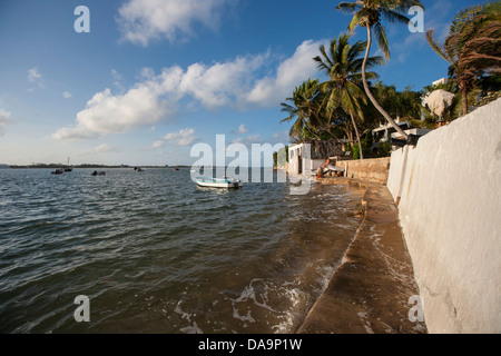 tropical sea wall on a small island Stock Photo