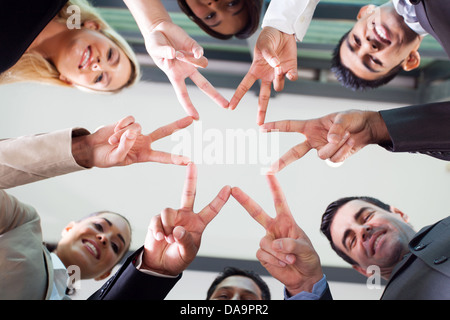 group business people hands forming a star shape Stock Photo