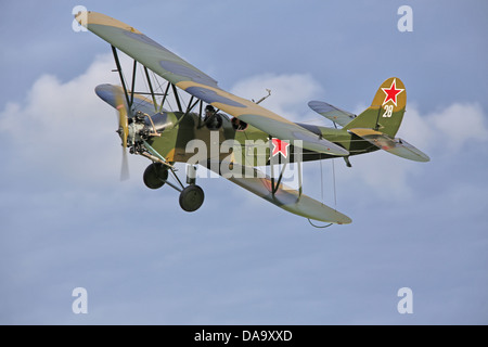 Polikarpov U-2/Po-2 Russian biplane flying at the Shuttleworth Trust Spring Airshow in 2013 Stock Photo