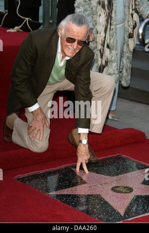 US artist and comic book creator Stan Lee poses his star at the Hollywood Walk of Fame in California, USA, 04 January 2011. Lee, publisher of Marvel Comics since 1972 and co-creator of Spider-Man, The Incredible Hulk and Iron Man, among others, was awarded the 2,428th Star on the Hollywood Walk of Fame. Photo: Hubert Boesl Stock Photo