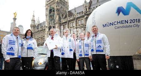 (L-R) President of German Olympic Sports Confederation (DOSB) Thomas Bach, head of Munich 2018 Olympic bid committee Katarina Witt, Munich Lord Mayor Christian Ude, Garmisch-Partenkirchen Mayor Thomas Schmid, head of Berchtesgardener Land district authority Georg Grabner, head of State Chancellery  Siegfried Schneider, managing directors of Munich 2018 Olympic bid Juergen Buehl and Stock Photo