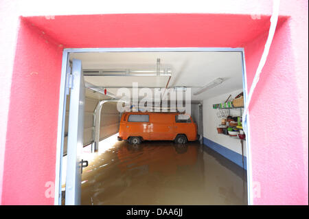 Staff of German Federal Agency for Technical Relief (THW)   transport resident through flooded Kitzingen, Germany, 11 January 2011. Thaw weather caused vast floodings in Germany. Photo: DAVID EBENER Stock Photo