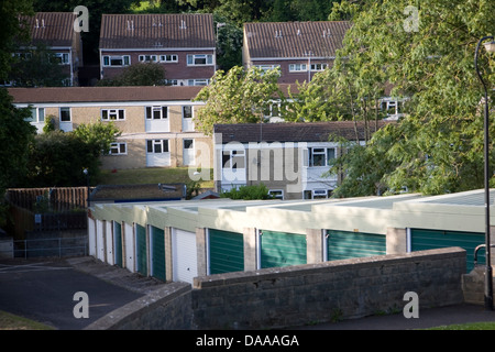 Row of garages in 1970s housing estate Larkhall Bath England Stock Photo