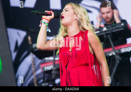 Rita Ora performs on the Pyramid Stage on the Friday of Glastonbury Festival. 28 June 2013 Stock Photo