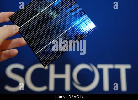 A file picture taken on 30 November 2005 shows a solar panel by Schott that is presented during a press conference on the company's performance in Alzenau, Germany. Schott, who produce solar cells, are planning to expand to China and widen their  capacity with the help of a Joint Venture. Photo: Boris Roessler Stock Photo