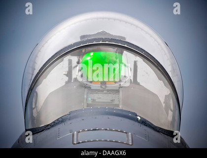 Capt. Eric Joachim, 335th Fighter Squadron standard and evaluation pilot, Seymour Johnson Air Force Base, N.C., conducts pre-flight checks during Green Flag-West 13-5 June 24, 2013, at Nellis Air Force Base, Nev. The mission of the 335th FS is to be prepa Stock Photo