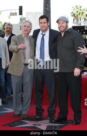 Actors Henry Winkler (l-r), Adam Sandler and Kevin James attend a ceremony honoring Sandler with a star on the Hollywood Walk of Fame in Los Angeles, USA, on 01 february 2011. Photo: Hubert Boesl Stock Photo