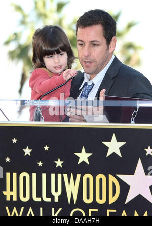 Actor Adam Sandler and his daughter Sunny attend the ceremony honoring actor Adam Sandler with a star on the Hollywood Walk of Fame in Los Angeles, USA, on 01 february 2011. Photo: Hubert Boesl Stock Photo