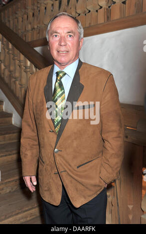 Former Austrian ski athlete Karl Schranz poses during the 20th Bavarian Veal Sausage Party Going, Austria, 22 January 2011. The 2500 guests warmed up for the following Hahnenkamm Race in Kitzbuehl. Photo: Felix Hoerhager Stock Photo