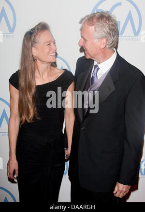 US director James Cameron and his wife, actress Suzy Amis Cameron, arrive for the 22nd Annual Producer's Guild Awards at Hotel Beverly Hilton in Beverly Hills, Los Angeles, USA, on 22 January 2011. Photo: Hubert Boesl Stock Photo