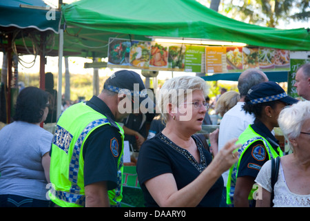 Mindil beach sunset markets,Darwin,northern territory,Australia with male and female police officers on patrol