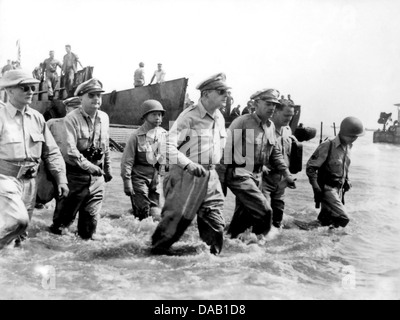 DOUGLAS MacARTHUR (1880-1964) American General returns to the Philippines at Leyte on 22 October 1944. Photo taken by MacArthur's personal photographer Gaetano Faillace. See Description below. Stock Photo