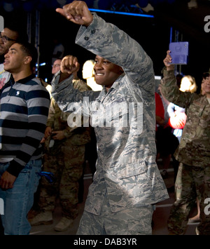 Airman 1st Class D Andre Mucker dances during an Ashanti Concert at Transit Center at Manas, Kyrgyzstan, on the Fourth of July, Stock Photo