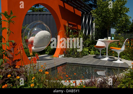 Hampton Court, UK. 8th July 2013. Mid Century Modern Garden at RHS Hampton Court Palace Flower Show 2013  on Press Day, Monday 8th July 2013 in London, UK. The Gold medal winning garden was designed by Adele Ford and Susan Willmott  and was awarded Best  Low Cost High Impact Garden. Credit:  Miriam Heppell/Alamy Live News Stock Photo